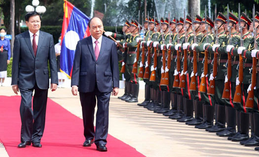 Lễ đón trọng thể Chủ tịch nước Nguyễn Xuân Phúc thăm hữu nghị chính thức Lào